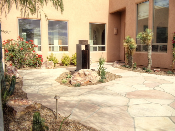 Warm entry courtyard landscape design with desert plantings